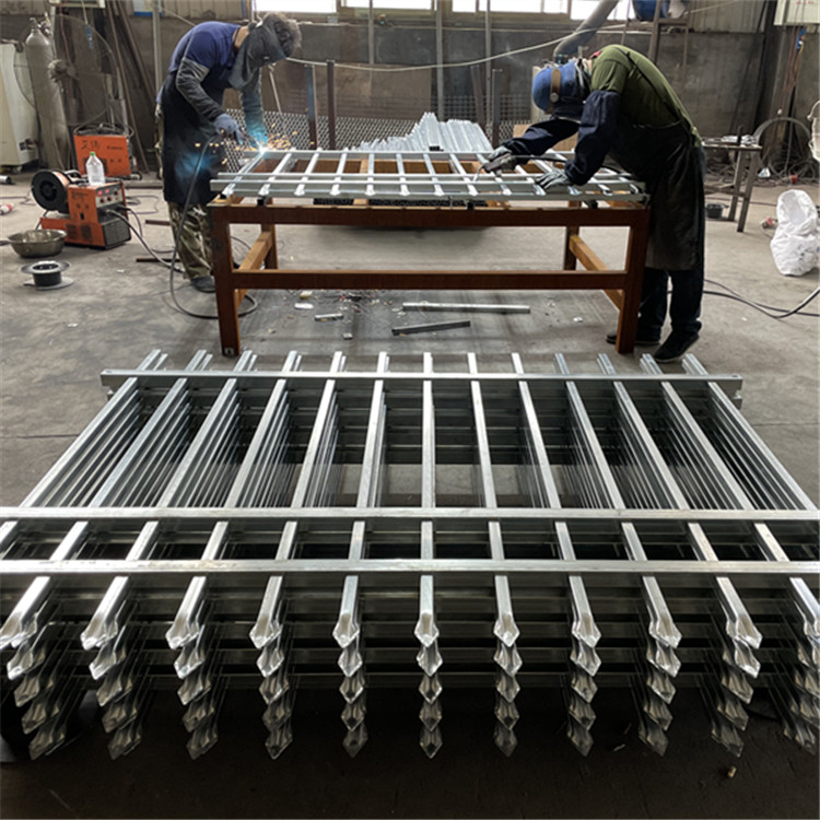 Steel fence is being welded