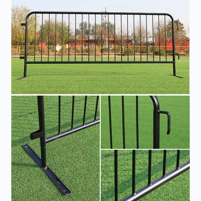 Temporary crowd control barriers being welded