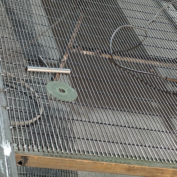 welding a fine-textured anti-climb fence